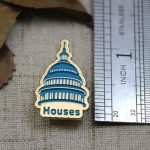 The Size of The Blue House Lapel Pin