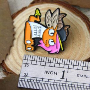 The Size of Shitty Kitty Lapel Pins