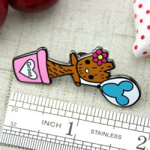 The Size of The Wooden Child Lapel Pin