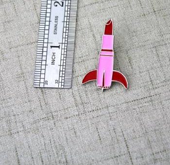 The Size of Lipsticks Lapel Pin