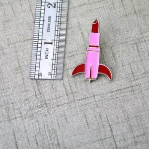 The Size of Lipsticks Lapel Pin