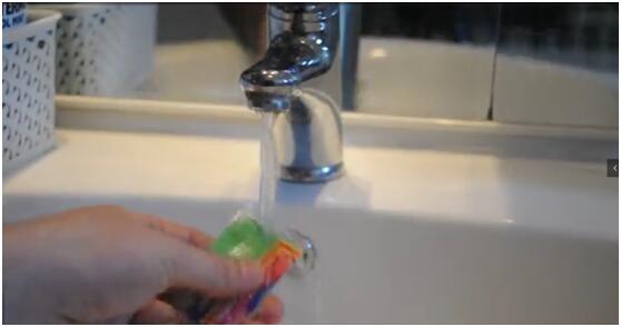 Rinse the sticker with warm water